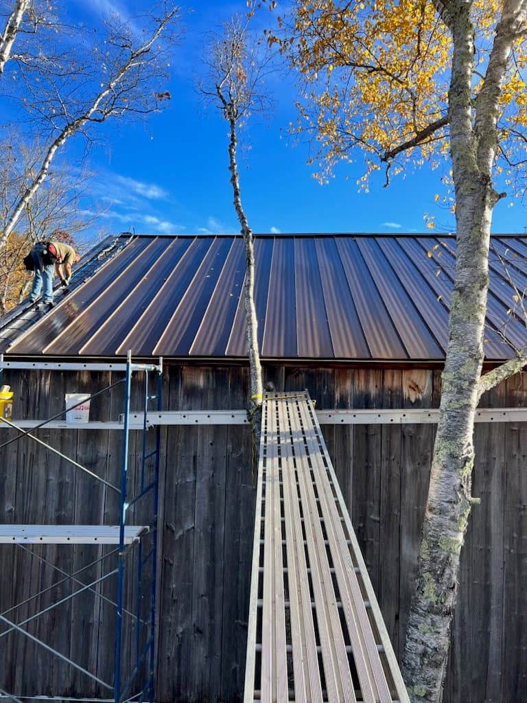 A standing seam metal roof on a barn